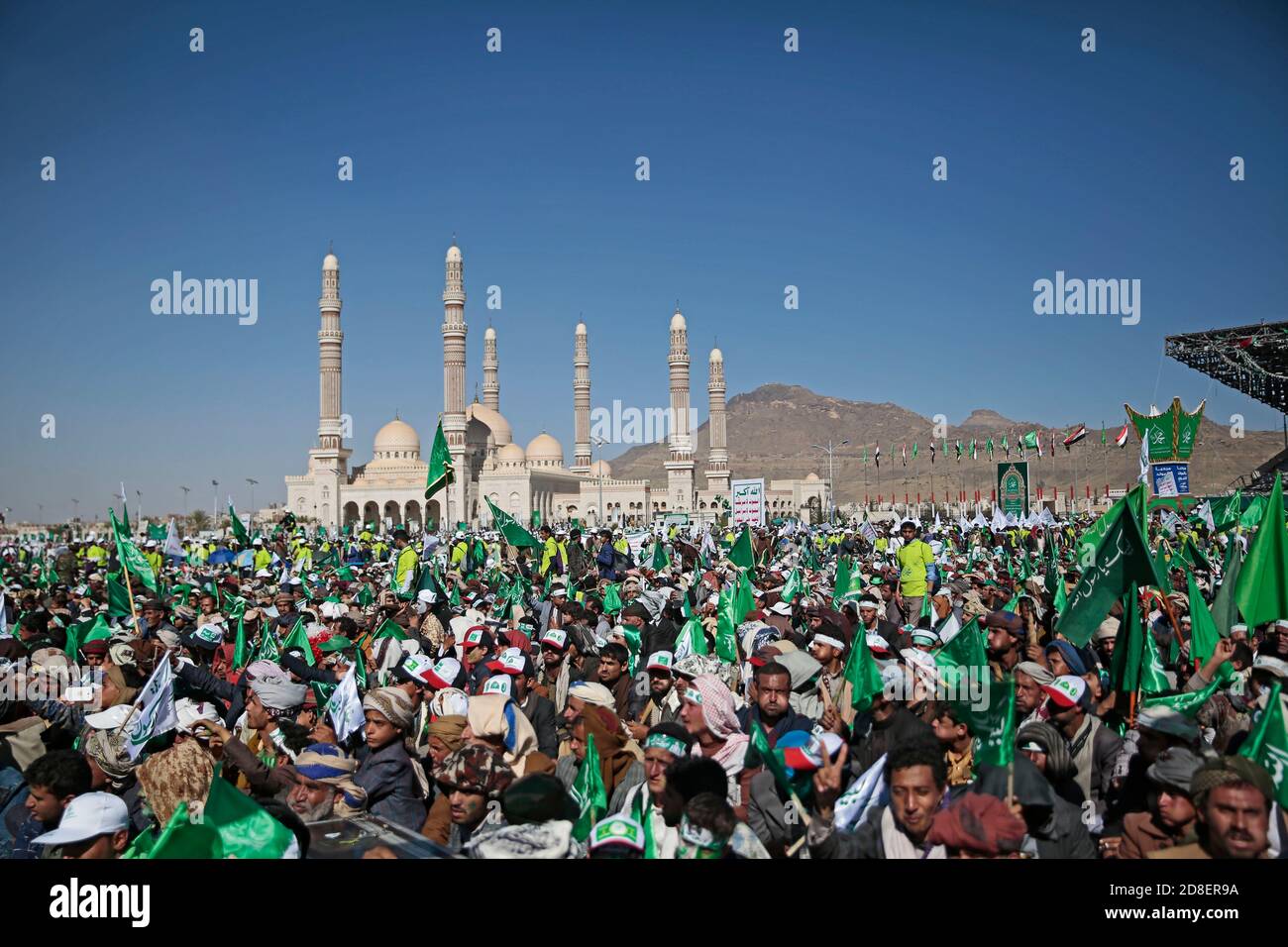 Sanaa, Yemen. 29th Oct, 2020. Houthi rebels and their supporters gather outside Al Saleh Mosque during a celebration marking the anniversary of the birth of Islam's Prophet Muhammad (Mawlid al-Nabi) in Sanaa. Credit: Hani Al-Ansi/dpa/Alamy Live News Stock Photo