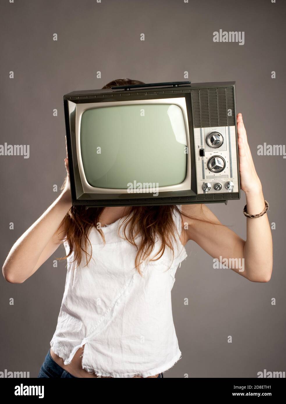 young woman with old retro tv Stock Photo - Alamy