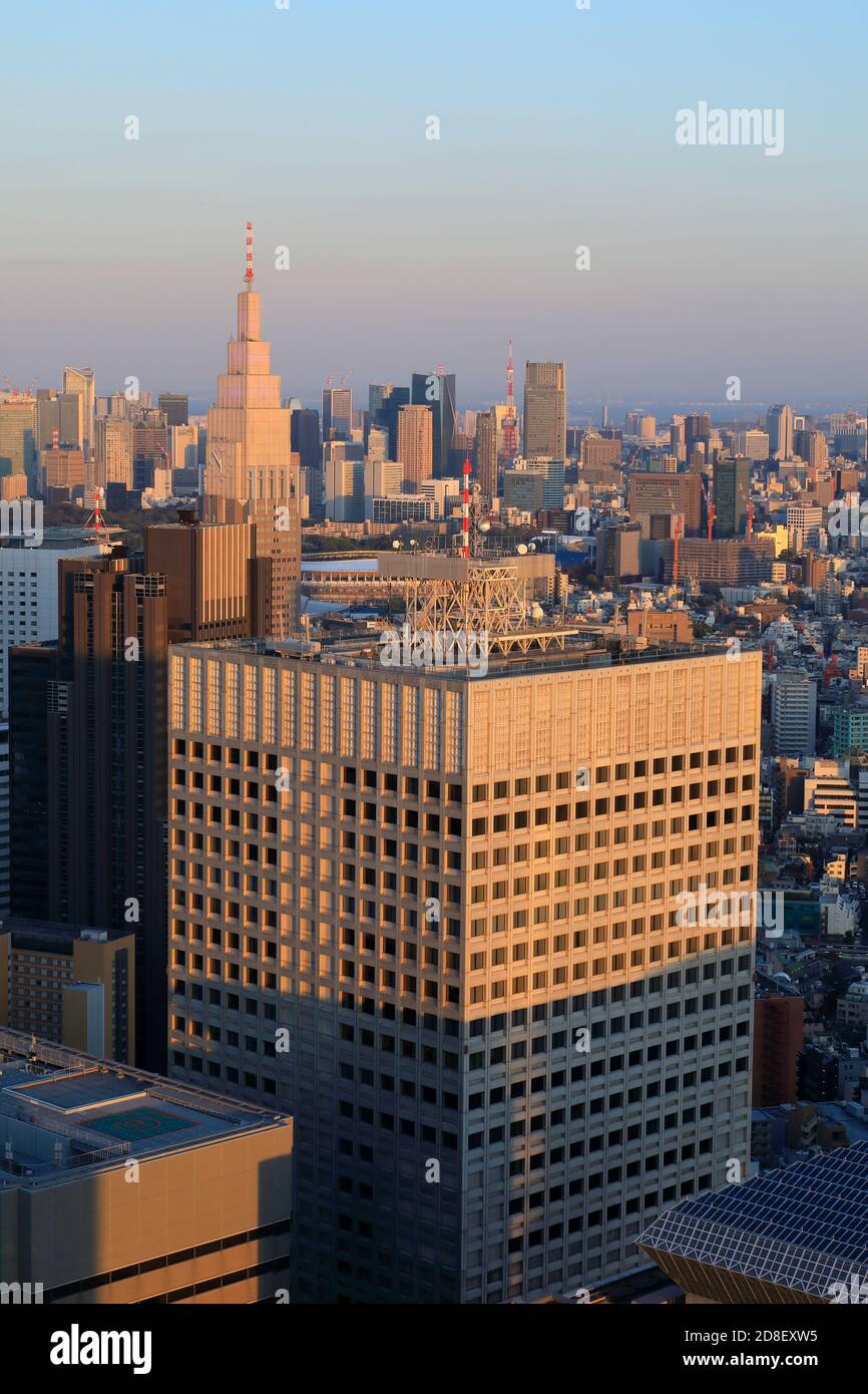 Tokyo cityscape with KDDI Building (foreground) and NTT Docomo Yoyogi Building from the observatory of Tokyo Metropolitan Government Building in Shinjuku.Tokyo.Japan Stock Photo