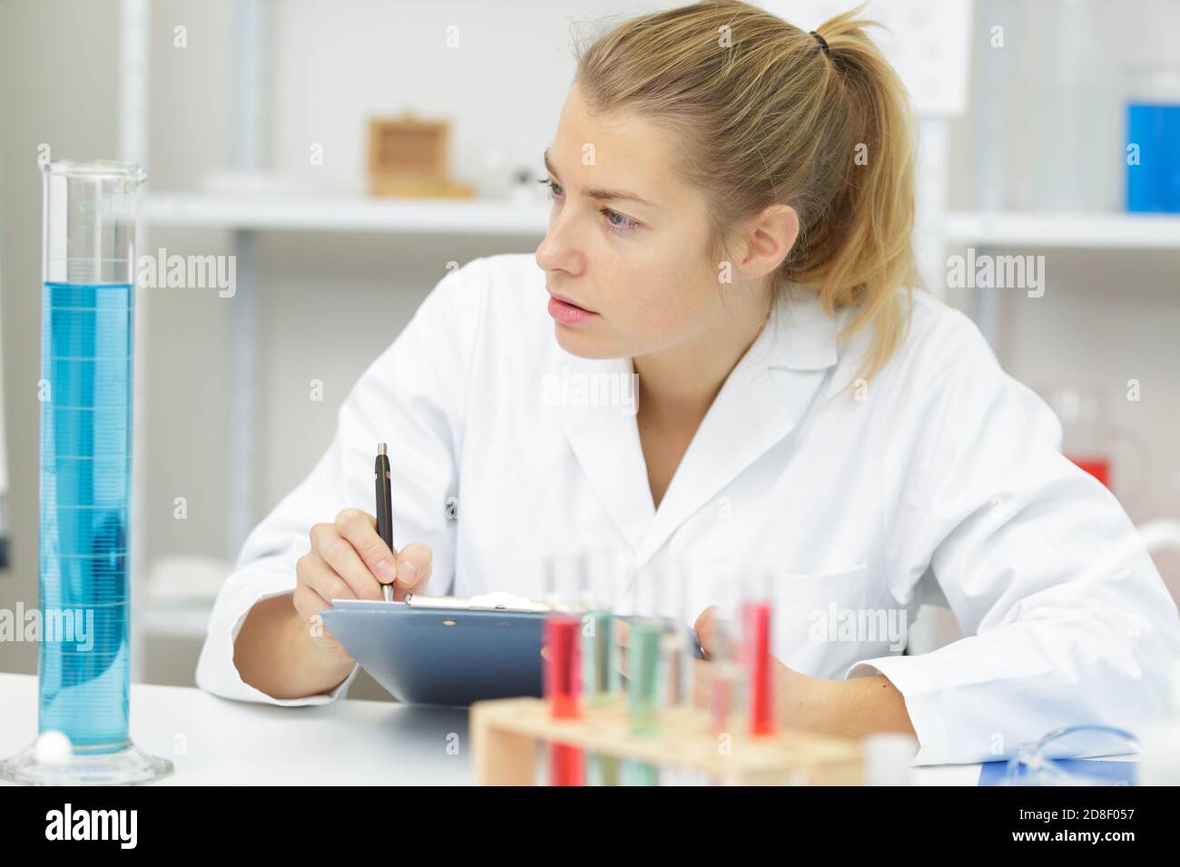laboratory technician observation on test tube Stock Photo Alamy
