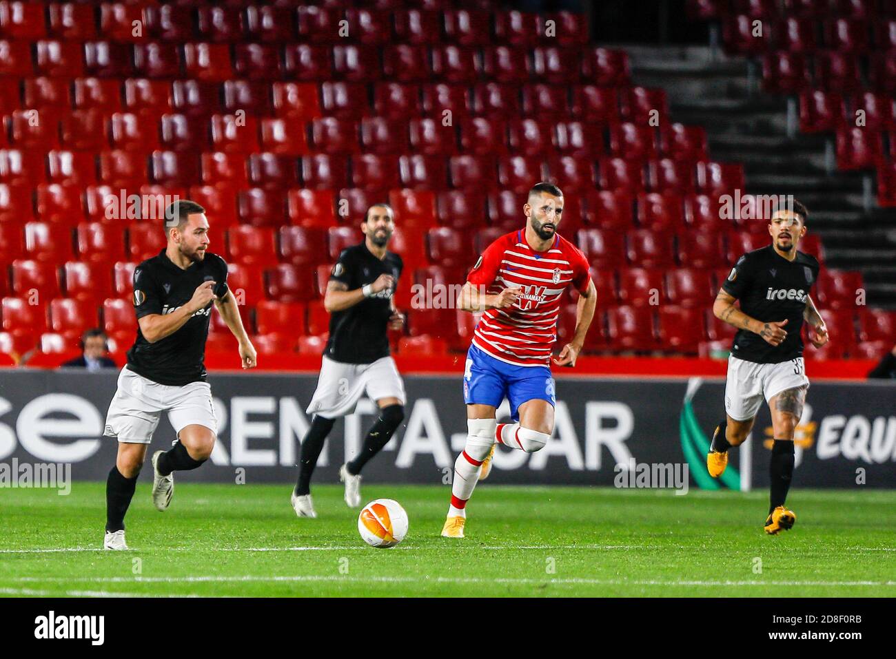 Rodrigo of Paok and Maxime Gonalons of Granada during the UEFA Europa League, Group Stage, Group E football match between Granada CF and Paok FC on October 29, 2020 at Los Carmenes Stadium in Granada, Spain - Photo Joaquin Corchero / Spain DPPI / DPPI Credit: LM/DPPI/Joaquin Corchero/Alamy Live News Stock Photo