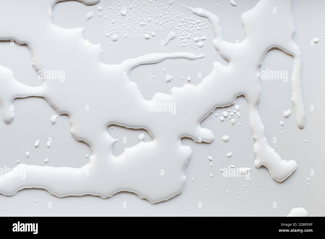 White drops water and milk Stock Photo - Alamy