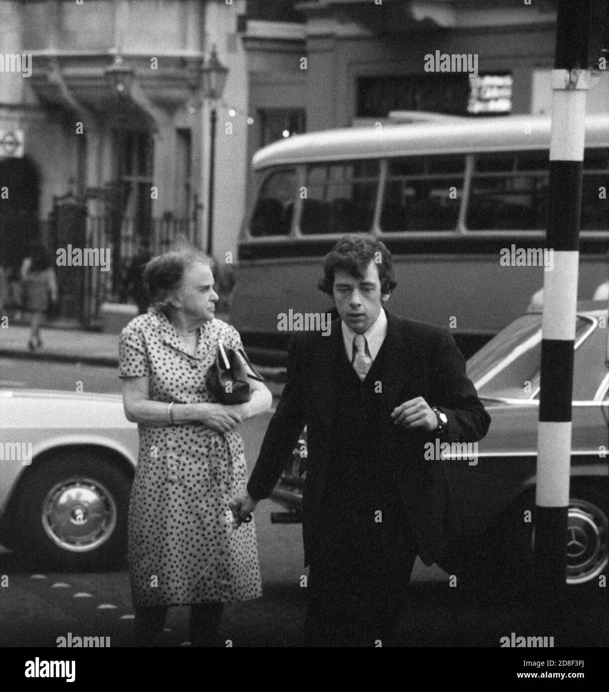 People cross the street  London 1971 Stock Photo