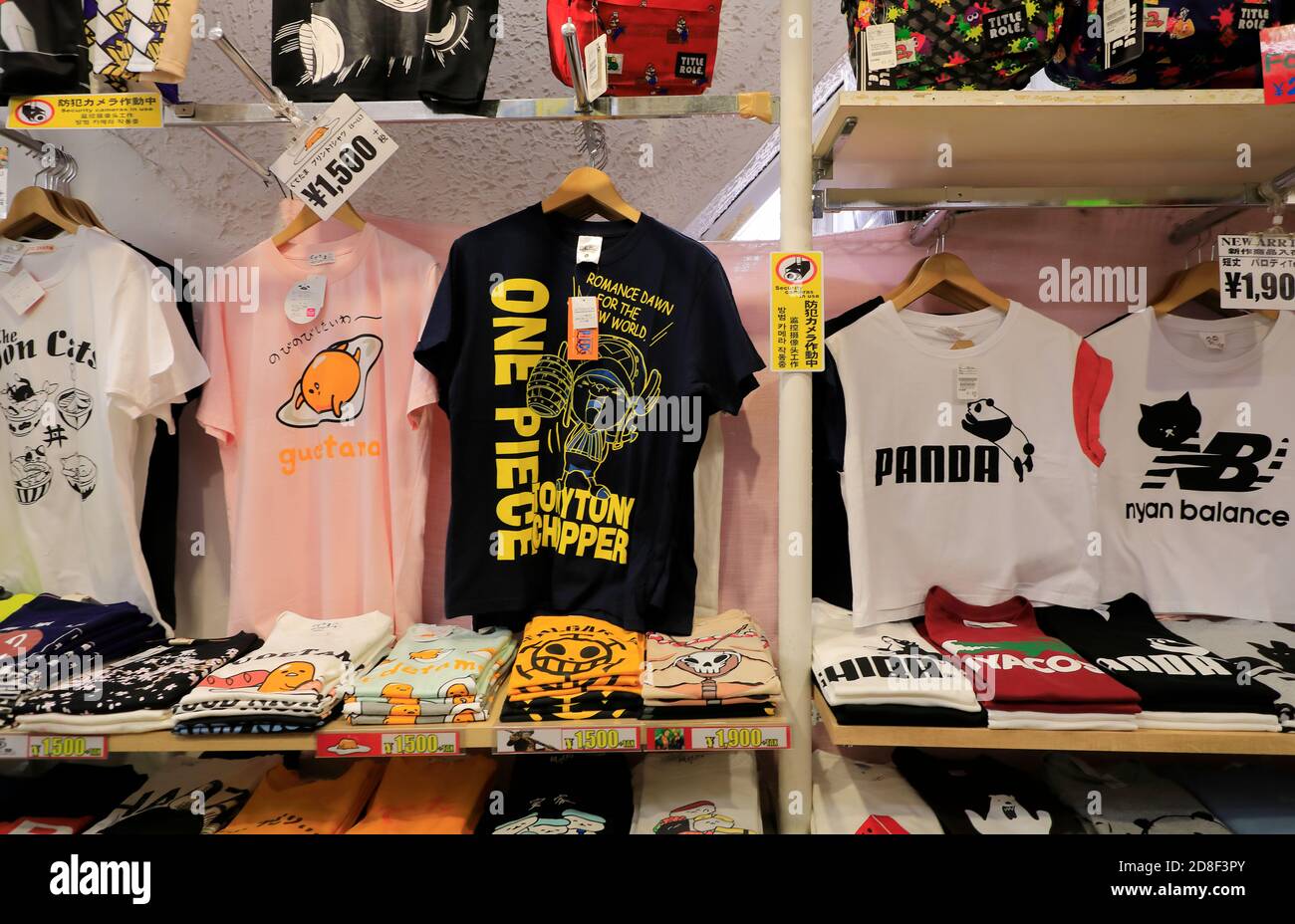 Designed T-shirts for sale in a store in Takeshita Street.Harajuku.Tokyo.Japan Stock Photo