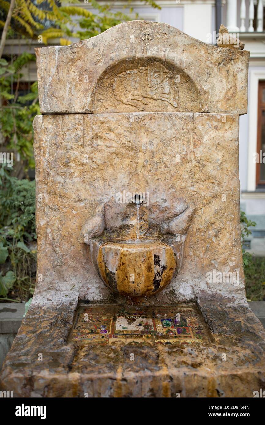 Medieval drinking fountain on the streets of old town Tbilisi, Caucasus, Eastern Europe