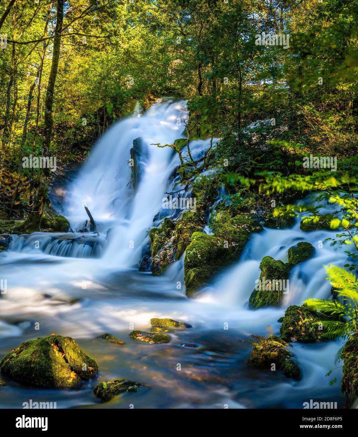 A small waterfall in a river in Fana, Bergen Stock Photo