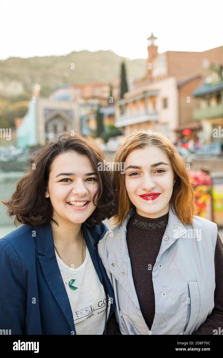 Portrait of two young women in old town Tbilisi, Georgia, Caucasus, Eastern Europe. Stock Photo