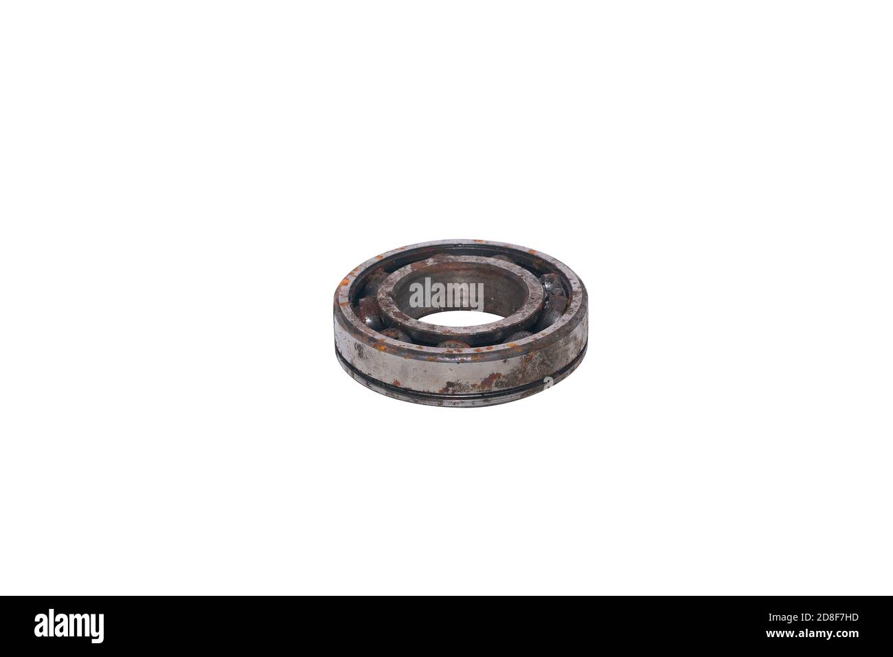 Old rusty bearing kit on a white background.Abandoned car part Stock Photo