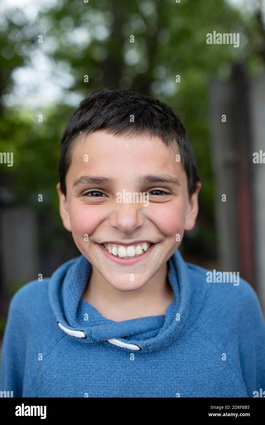 Closeup portrait of a young smiling boy in Gori, Georgia, Caucasus, Eastern Europe. Stock Photo