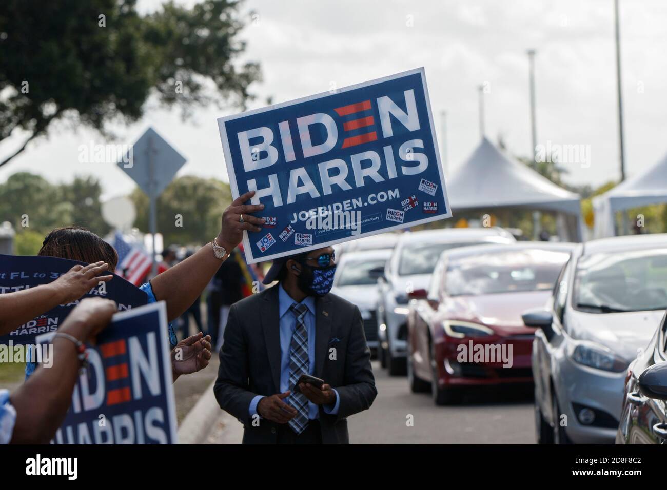 Coconut Creek, United States. 29th Oct, 2020. October 29, 2020 - Coconut Creek, FL: Supporters outside former Vice President Joe Biden's 2020 Presidential Campaign event at Broward College on October 29, 2020 in Coconut Creek, Florida. Credit: Maurice Ross/The Photo Access Credit: The Photo Access/Alamy Live News Stock Photo
