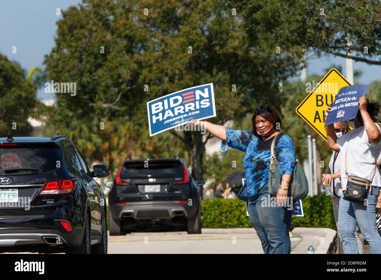 Coconut Creek, United States. 29th Oct, 2020. October 29, 2020 - Coconut Creek, FL: Supporters outside former Vice President Joe Biden's 2020 Presidential Campaign event at Broward College on October 29, 2020 in Coconut Creek, Florida. Credit: Maurice Ross/The Photo Access Credit: The Photo Access/Alamy Live News Stock Photo