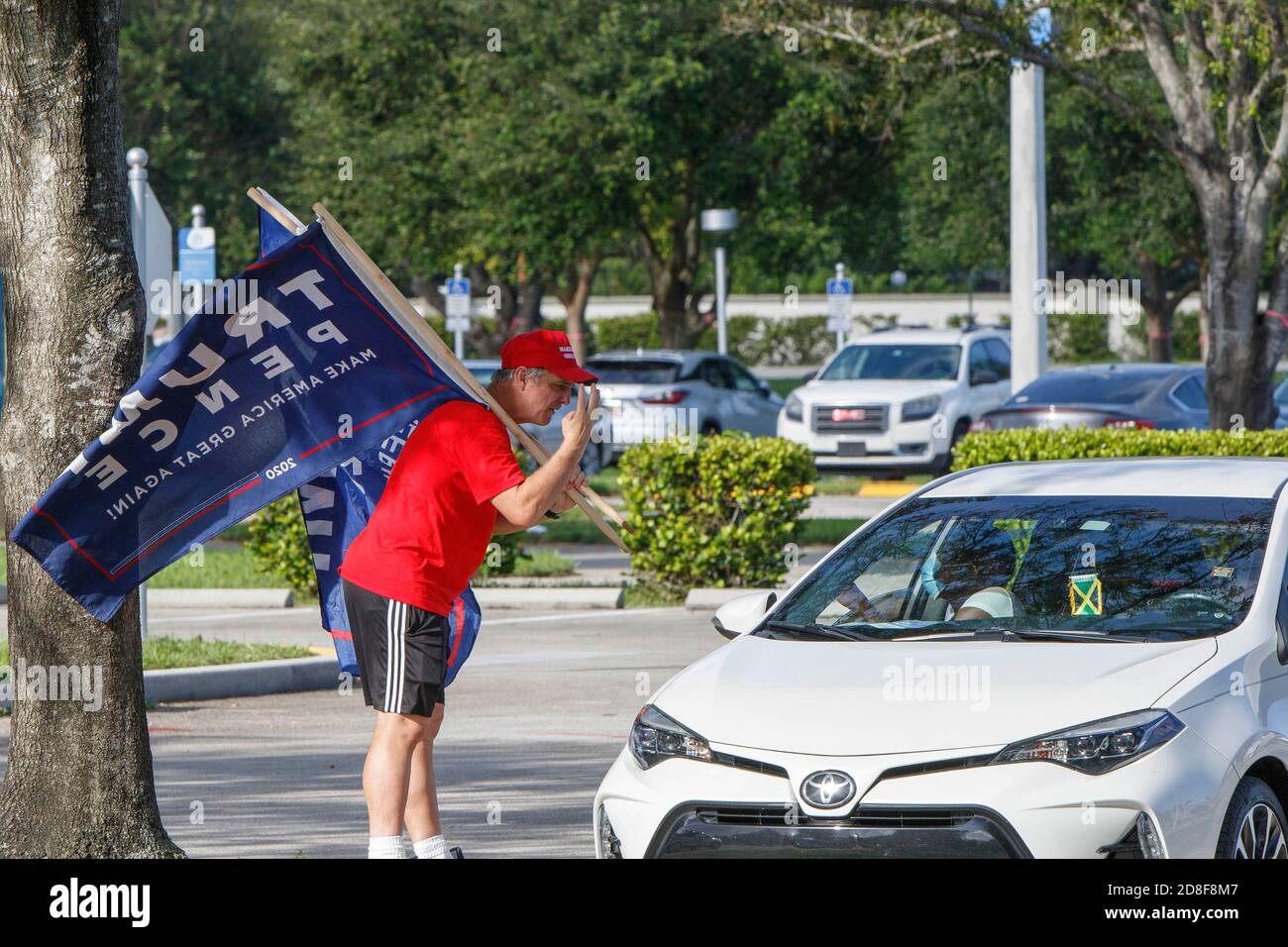 Coconut Creek, United States. 29th Oct, 2020. October 29, 2020 - Coconut Creek, FL: President Trump supporters protest outside former Vice President Joe Biden's 2020 Presidential Campaign event at Broward College on October 29, 2020 in Coconut Creek, Florida. Credit: Maurice Ross/The Photo Access Credit: The Photo Access/Alamy Live News Stock Photo