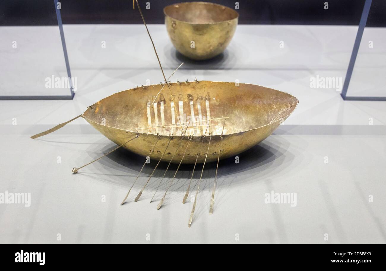 Gold sailing ship. Artefacts that belongs to Iron Age Broighter hoard set. Archaeology National Museum of Ireland Stock Photo