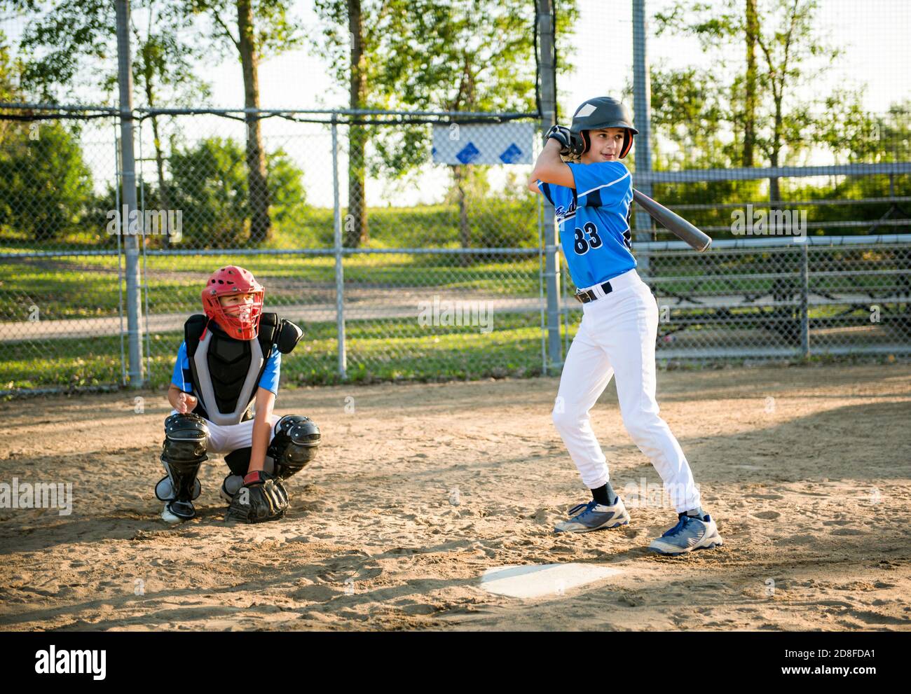 Group of baseball players play together on the playground Stock Photo -  Alamy