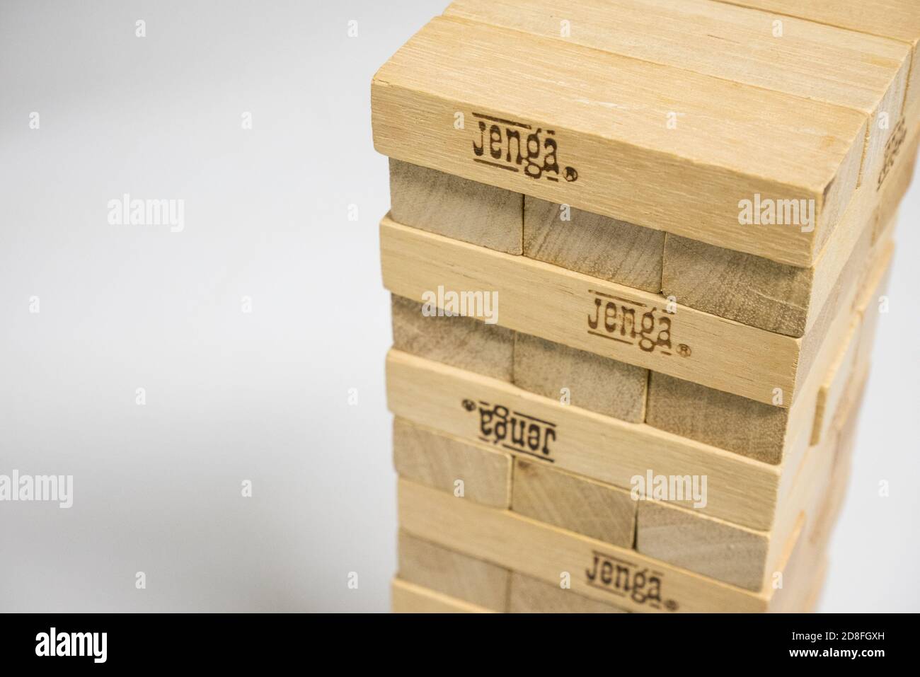 Jenga family game wooden block tower Stock Photo Alamy