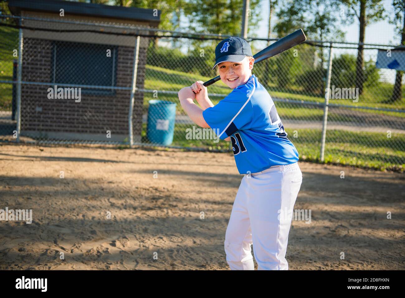 Youth Baseball Player at Bat Stock Image - Image of america, shadow:  32451459