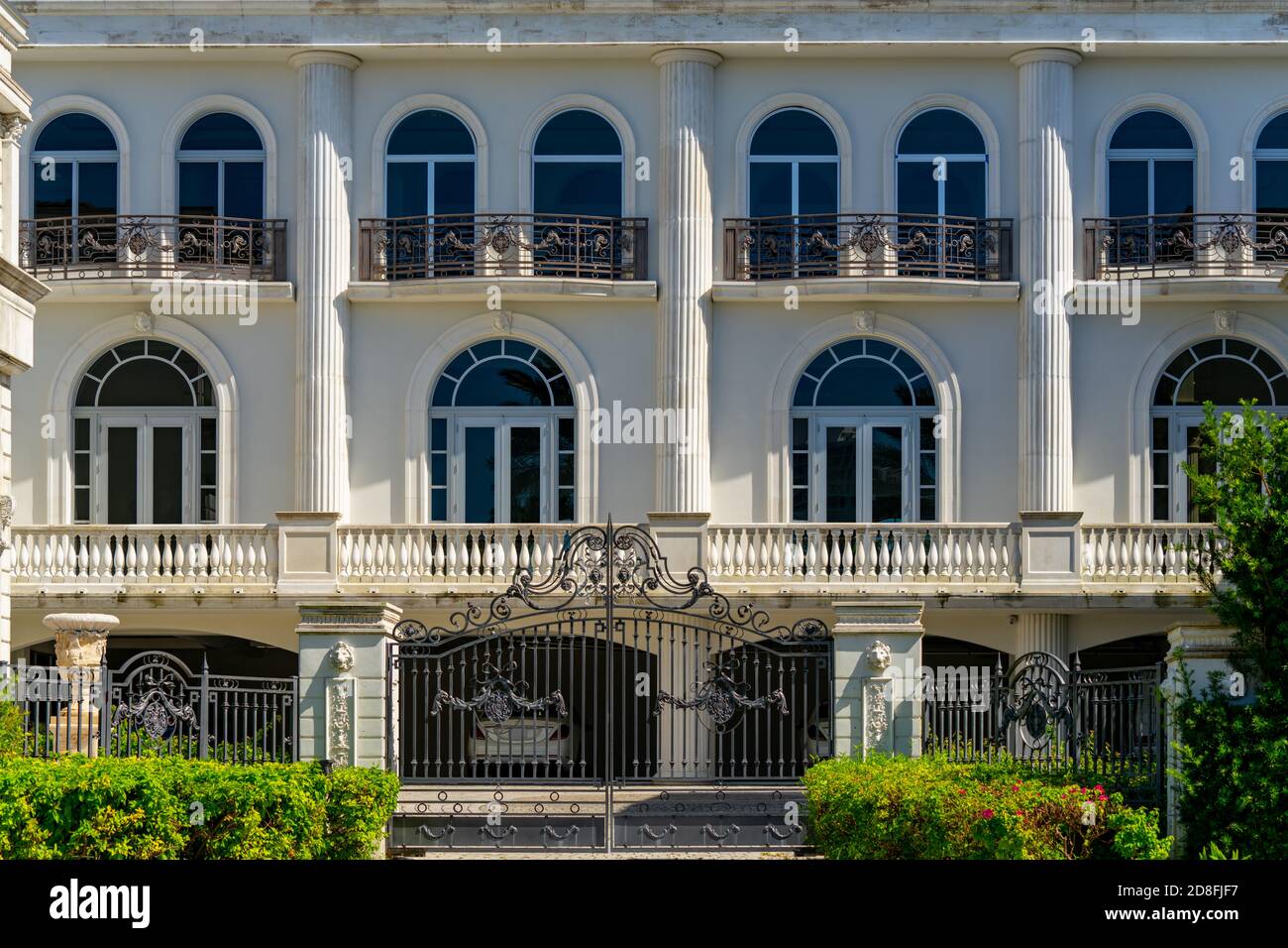 Luxury lavish house with security gate Stock Photo - Alamy