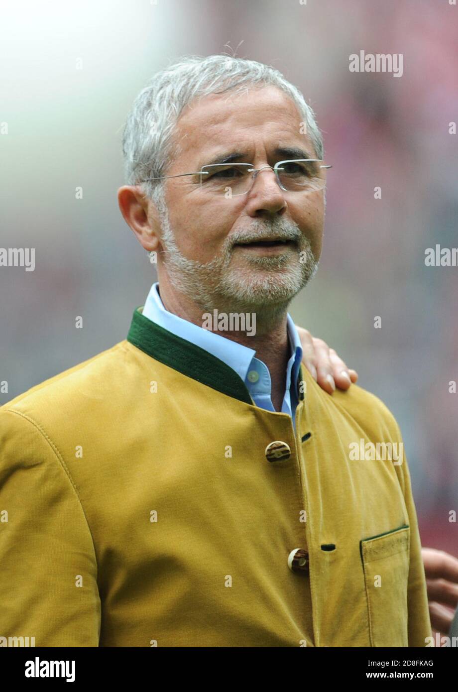 Munich, Germany. 11th May, 2013. The former FC Bayern Munich footballer, Gerd Müller, is honoured in the Allianz Arena before a Bundesliga match. (to dpa 'The 'Bomber' becomes 75: Gerd Müller 'cannot be lifted high enough') Credit: picture alliance/dpa/Alamy Live News Stock Photo