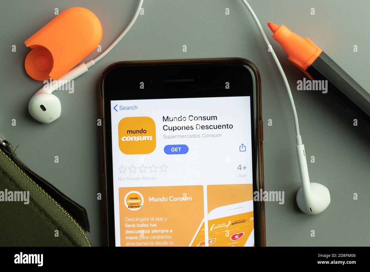 New York, USA - 26 October 2020: Mundo Consum Cupones Descuento mobile app icon logo on phone screen close-up, Illustrative Editorial Stock Photo