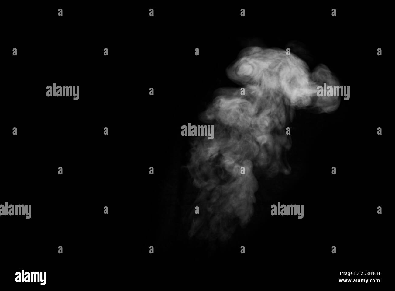 Close-up curls of steam or smoke with drops of moisture isolated on black background, low key, copy space Stock Photo