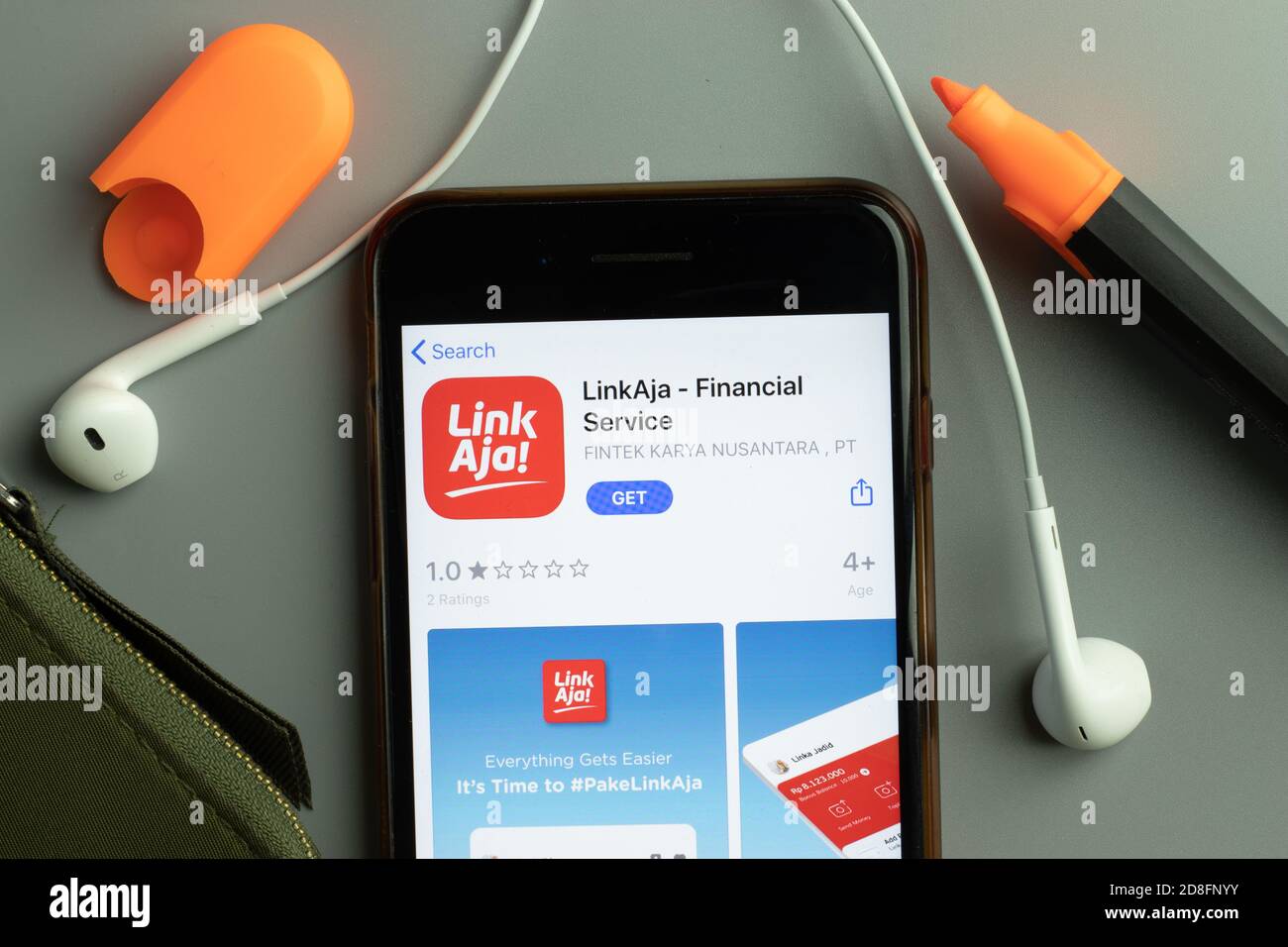 New York, USA - 26 October 2020: LinkAja Financial Service mobile app icon logo on phone screen close-up, Illustrative Editorial Stock Photo
