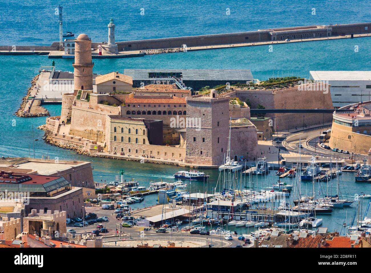 Marseille, Provence-Alpes-Côte d'Azur, France.  View down to the entrance of Vieux-Port, the Old Port, and the 17th century Fort Saint-Jean. Stock Photo