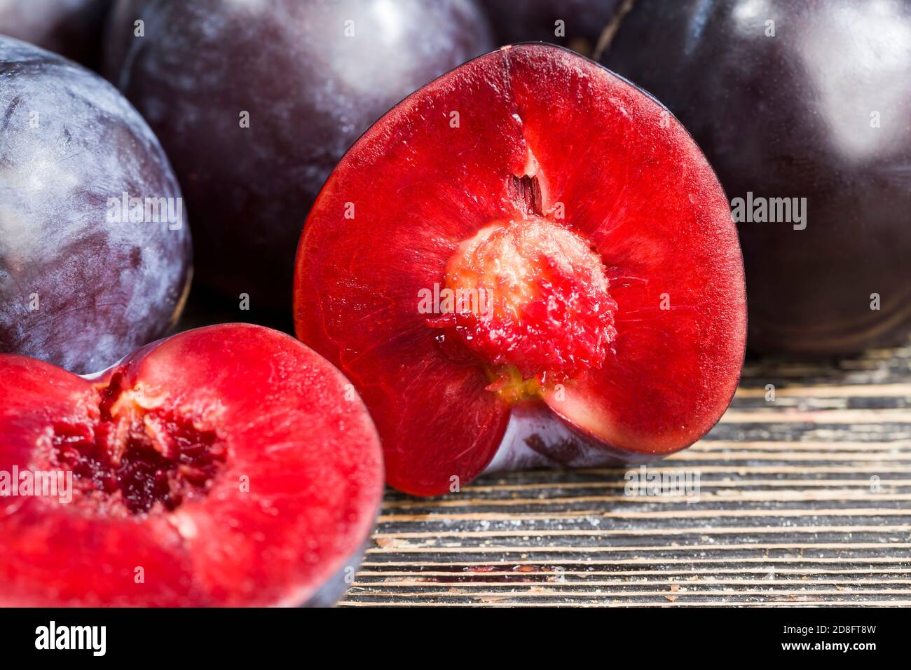 healthy sliced plums Stock Photo Alamy