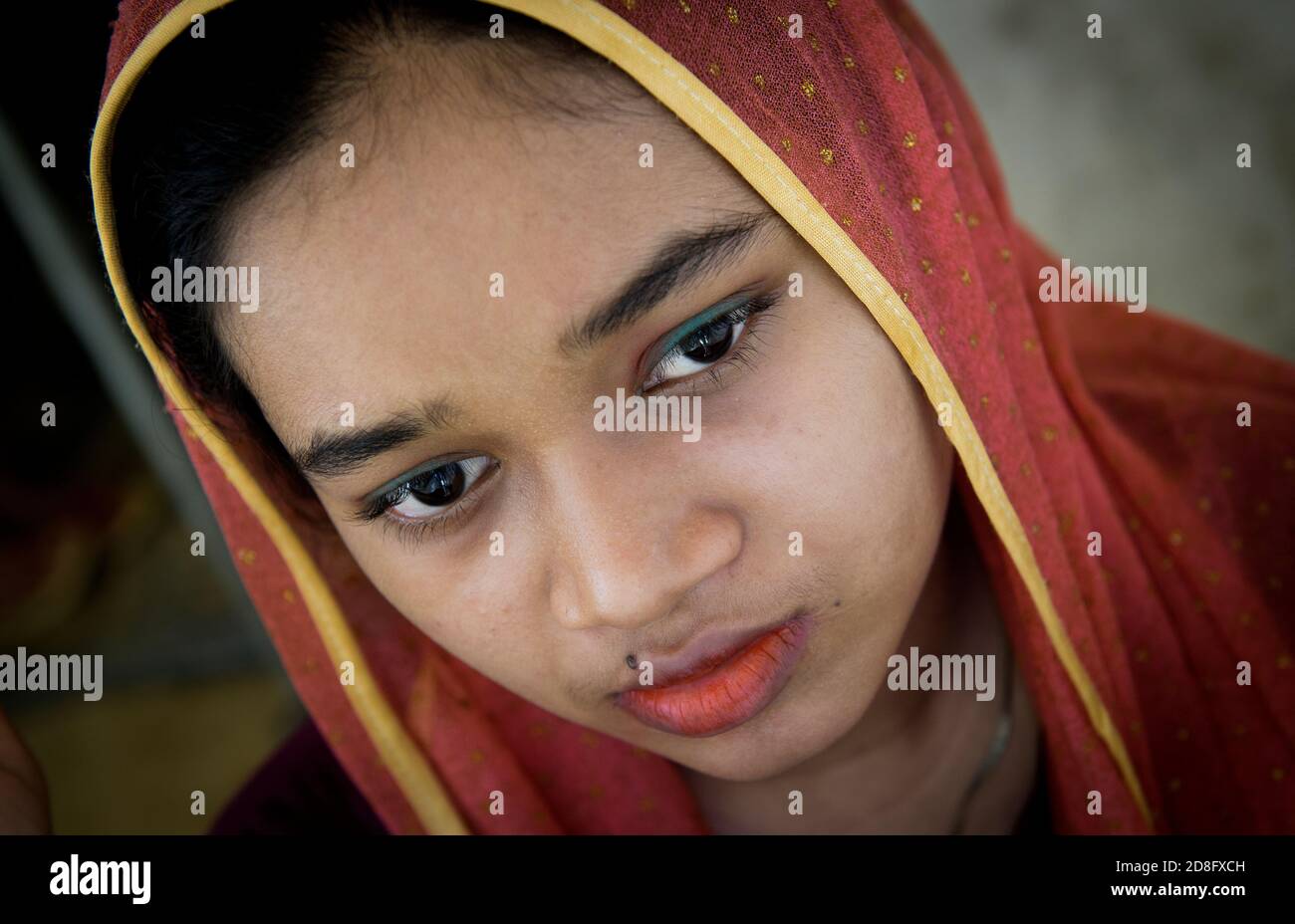 Rohingya refugee at the Kutupalong transit center . Over 650,000 Rohingya have crossed the border to Bangladesh since August last year, fleeing the violence. Stock Photo