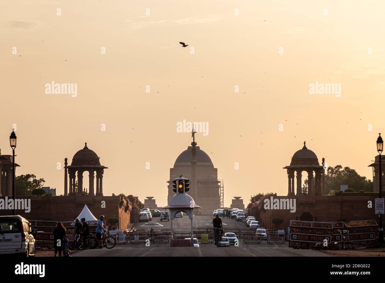 iew of the Rashtrapati Bhavan and administrative buildings in central Delhi in the backdrop of a sunset. Stock Photo