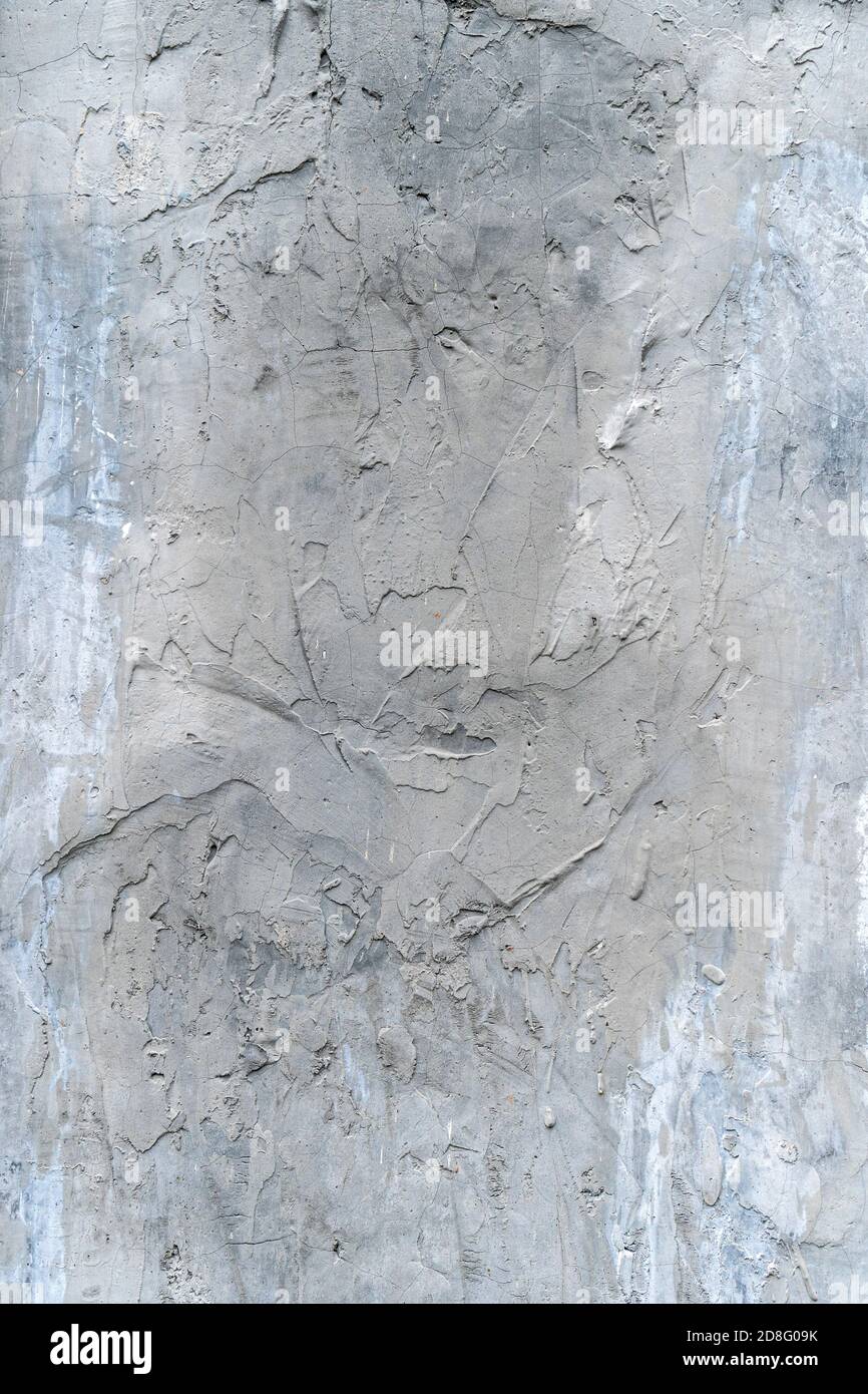 Cracks in the old plastered wall. Abstract background Stock Photo