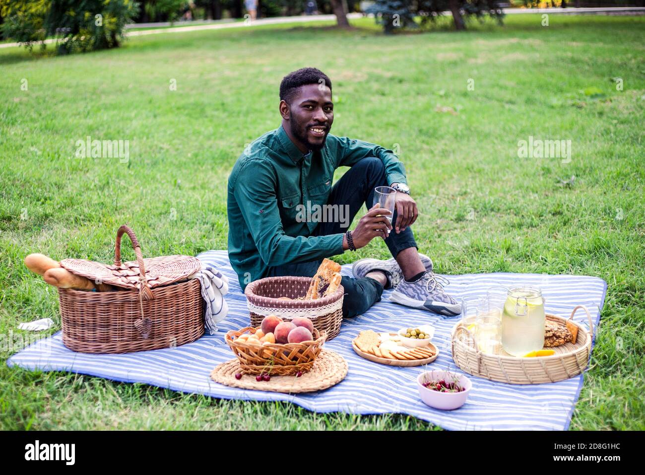 Attractive black man on picnic at sunny day Stock Photo Alamy
