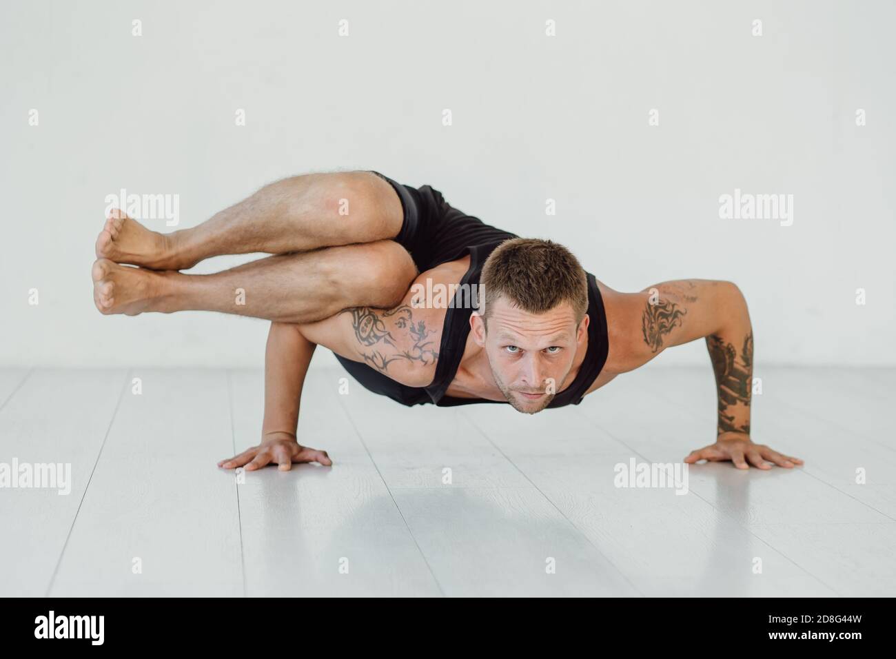 Hard yoga pose hi-res stock photography and images - Alamy