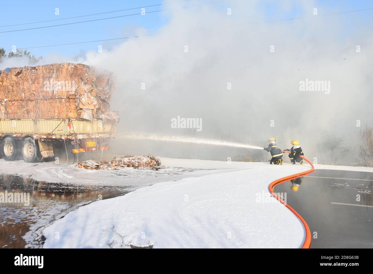 Suzhou, Suzhou, China. 30th Oct, 2020. AnhuiÃ¯Â¼Å'CHINA-Smoke billows and flames billow as a large truck loaded with cardboard boxes bursts into flames in Suzhou, Anhui province, on October 23, 2020. Smoke billowed into the sky after a semi-trailer loaded with old cardboard boxes burst into flames on the road of The Outer ring Road of Longcheng Town in Xiaoxian County, Anhui Province, at 15:30 p.m. After the local fire alarm, quickly rushed to the scene to carry out the fight. Credit: SIPA Asia/ZUMA Wire/Alamy Live News Stock Photo