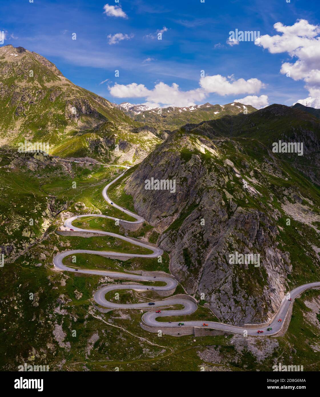 Aerial view of an old road going through the St. Gotthard pass in the Swiss Alps Stock Photo