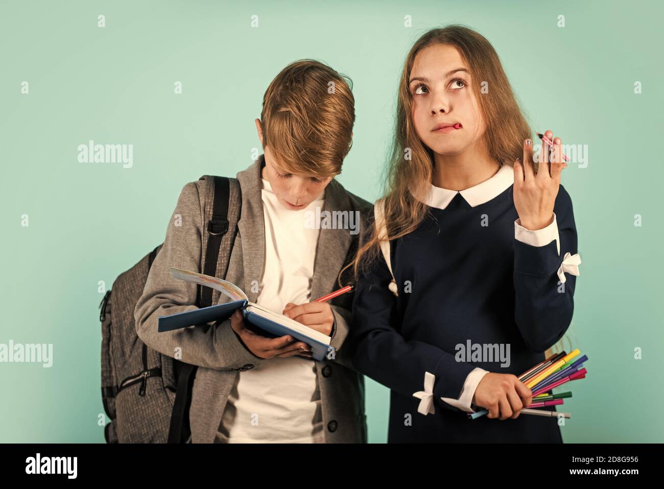 Study together. Student ready for lessons. Regular school program. School education for advanced level. Easy learning concept. International students exchange. School knowledge. Talent development. Stock Photo