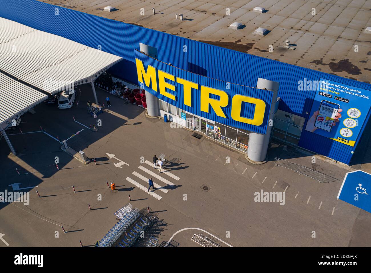 Metro retail store, large shopping mall of household and food goods with parking, aerial view, copyspace Stock Photo