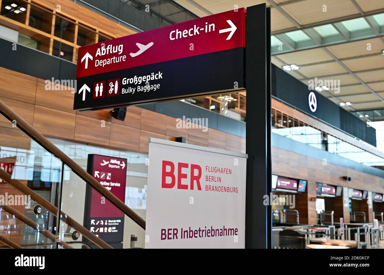 30 October 2020, Brandenburg, Schönefeld: Signposts are located in Terminal 1 of the Capital Airport Berlin Brandenburg 'Willy Brandt' (BER). The opening of the Capital Airport BER is planned for 31.10.2020. Photo: Patrick Pleul/dpa-Zentralbild/dpa Stock Photo