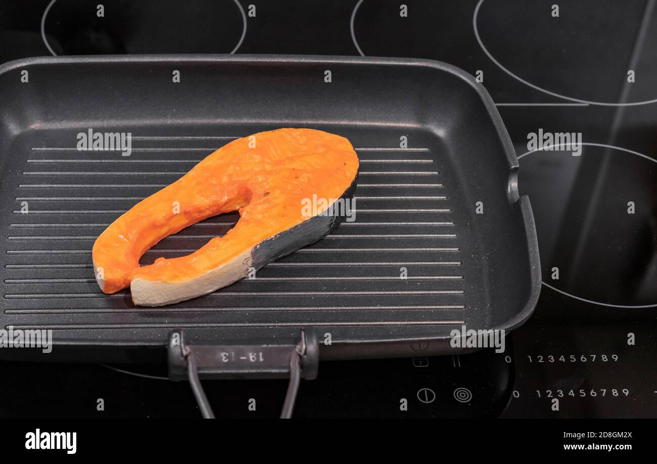 Nonstick frying pan on induction hob. Cooking concept Stock Photo Alamy