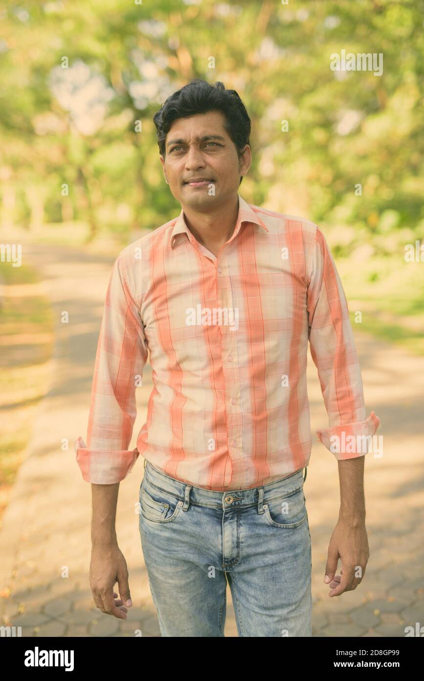 Indian man standing hi-res stock photography and images - Alamy