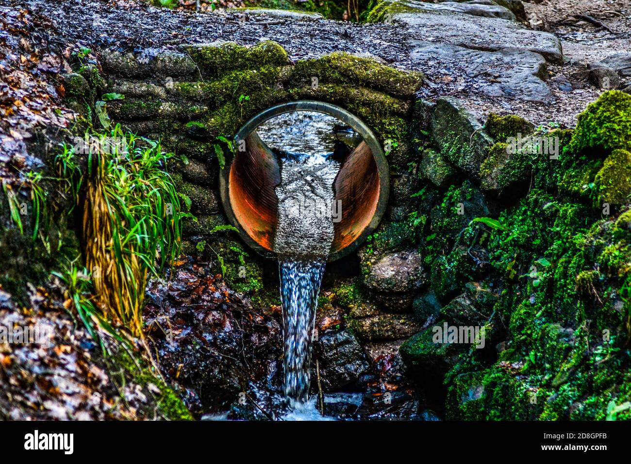 water flowing hole Stock Photo - Alamy
