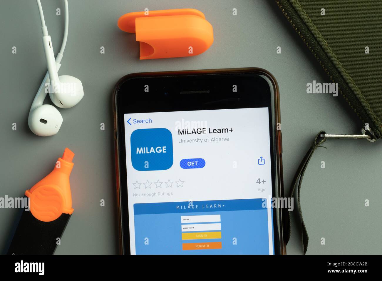 New York, USA - 26 October 2020: MILAGE learn plus mobile app icon logo on phone screen close-up, Illustrative Editorial Stock Photo