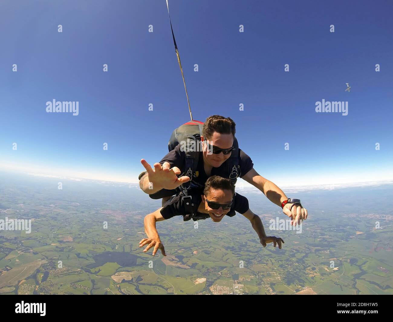 Skydiving tandem friends bliss happy Stock Photo
