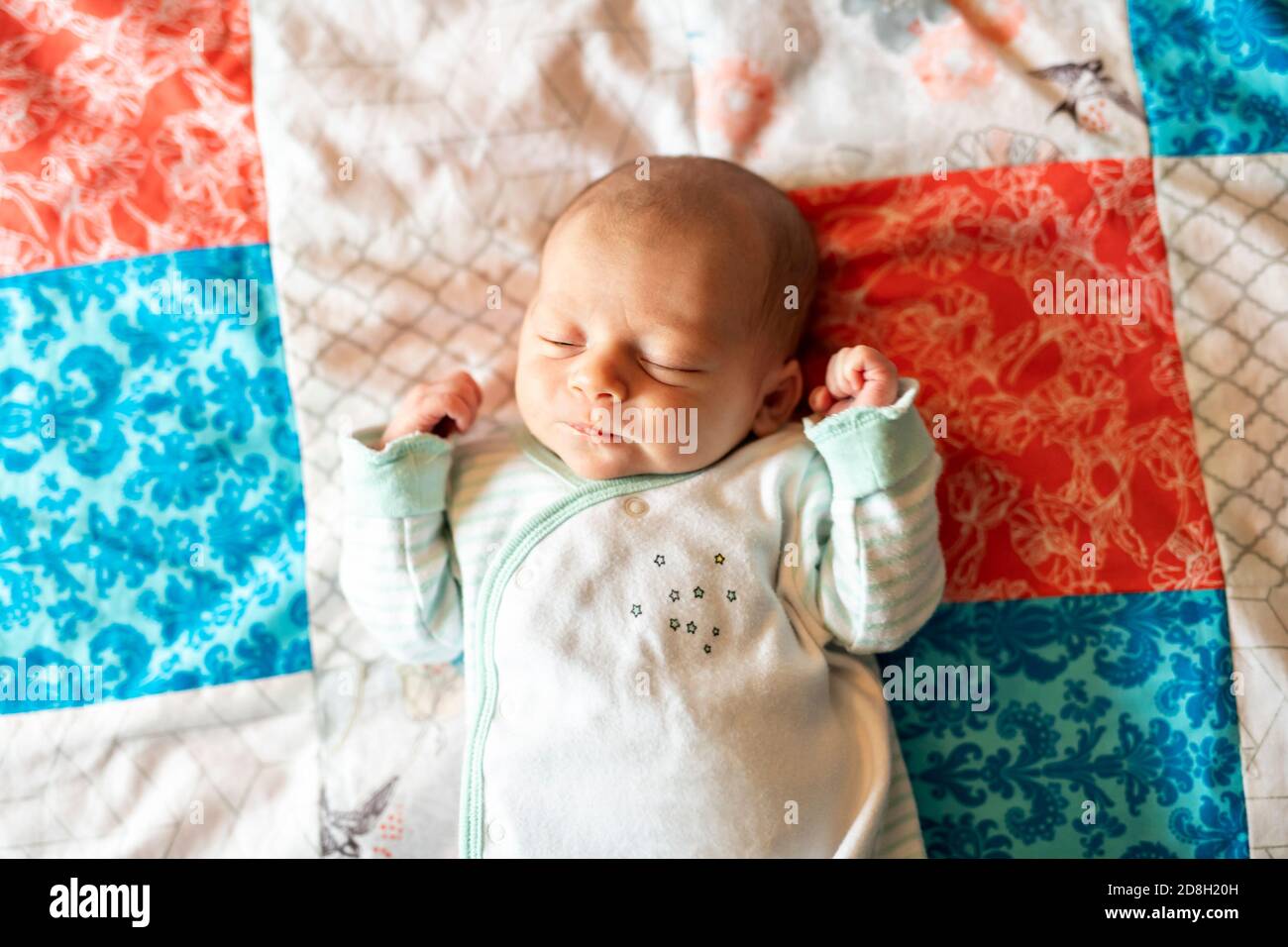 Little Newborn Sleeping on the parent bed Stock Photo Alamy