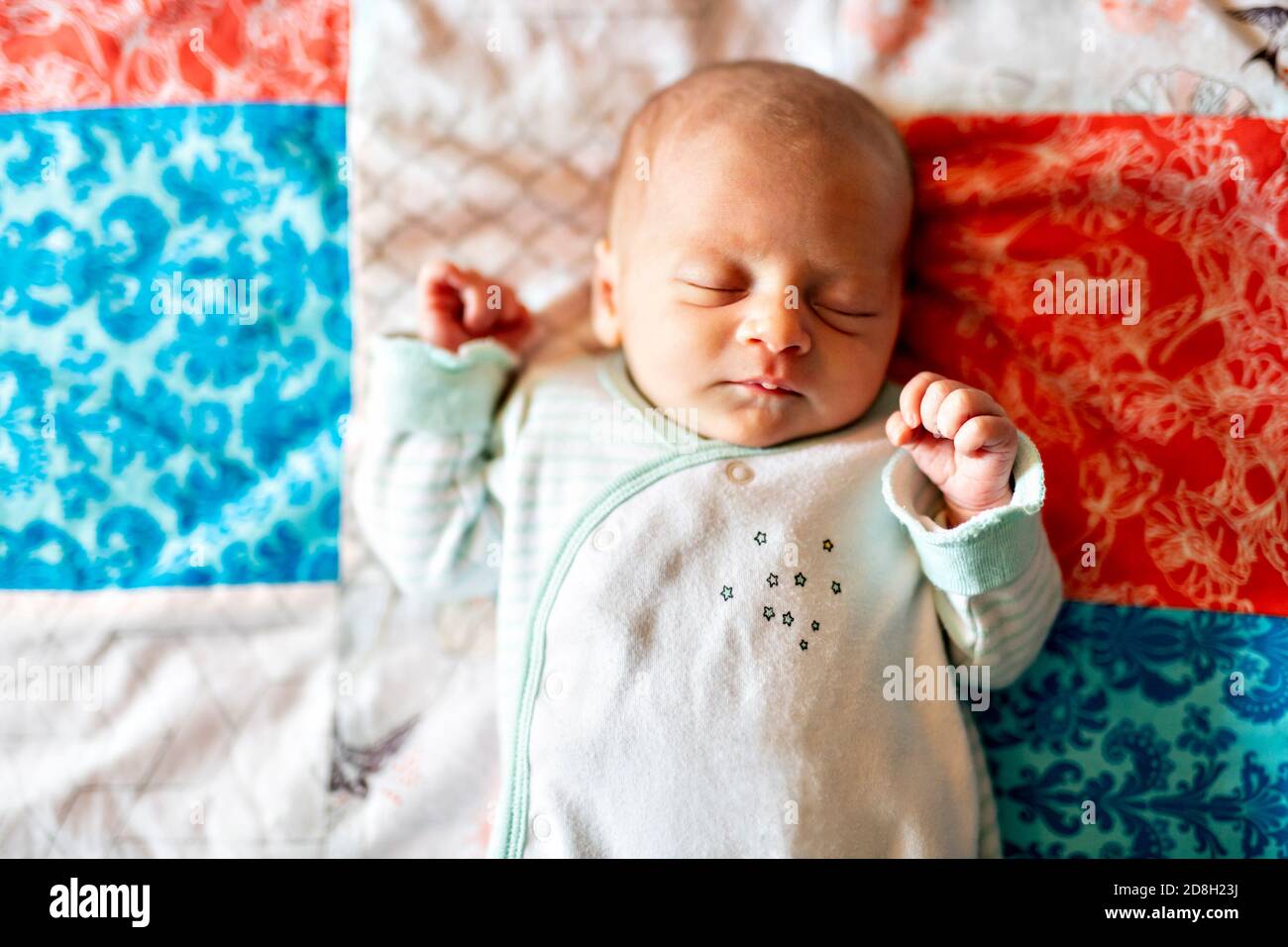 Little Newborn Sleeping on the parent bed Stock Photo Alamy
