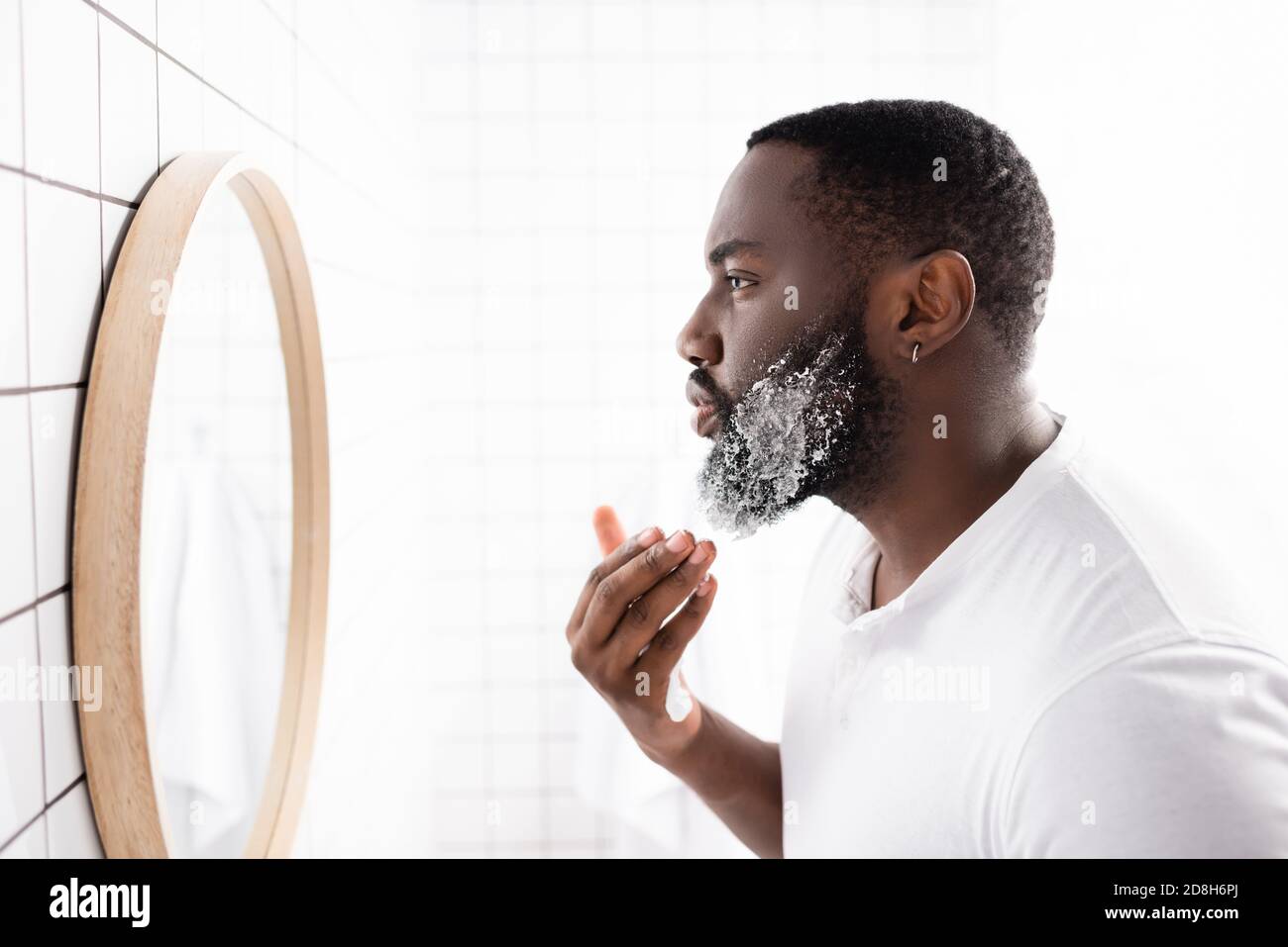 Handsome black man applying hi-res stock photography and images - Alamy