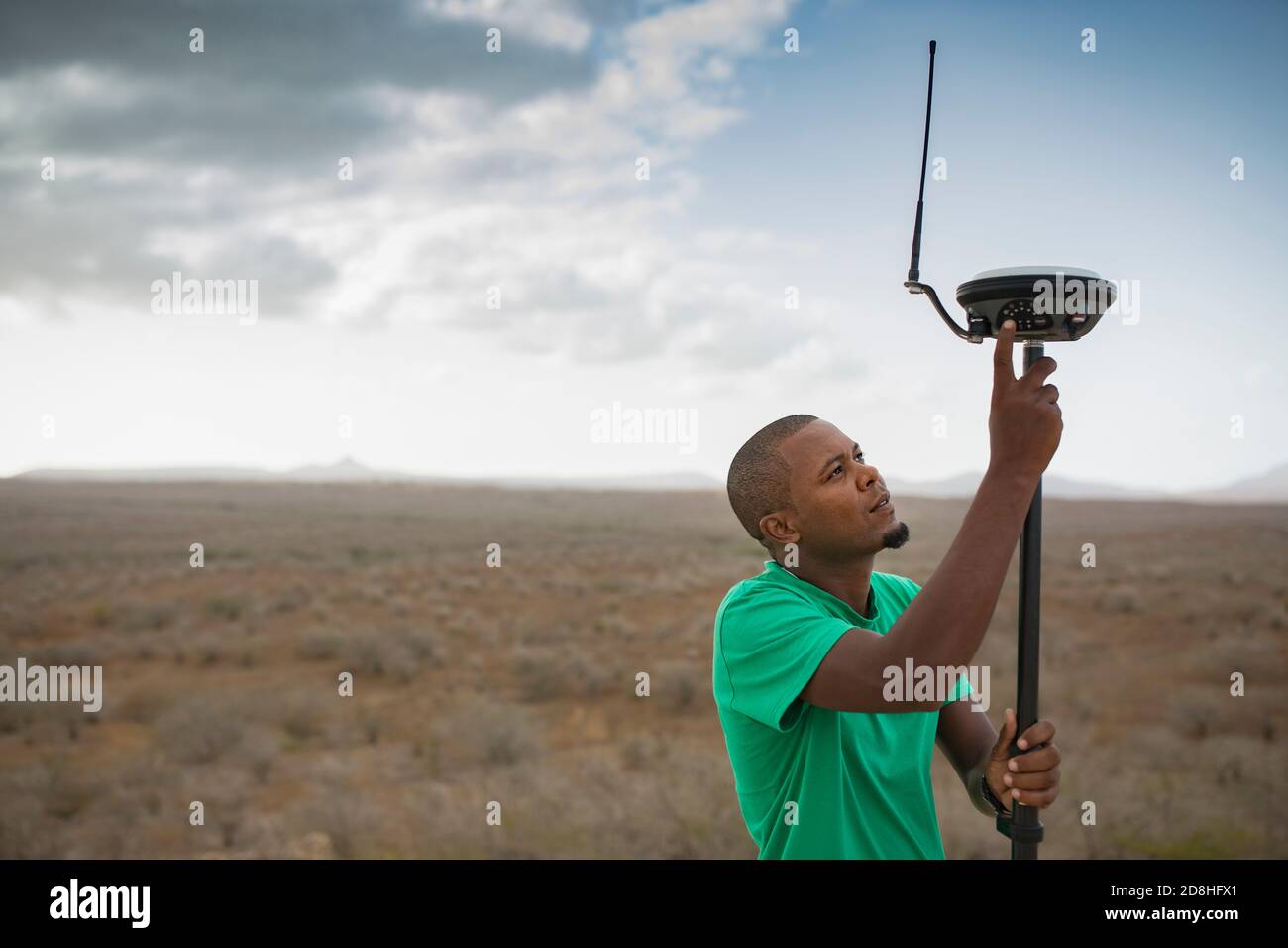 A group of cadastre technicians work to geomap a remote village on the island of Maio, Cape Verde, as part of a national land boundary survey. Stock Photo