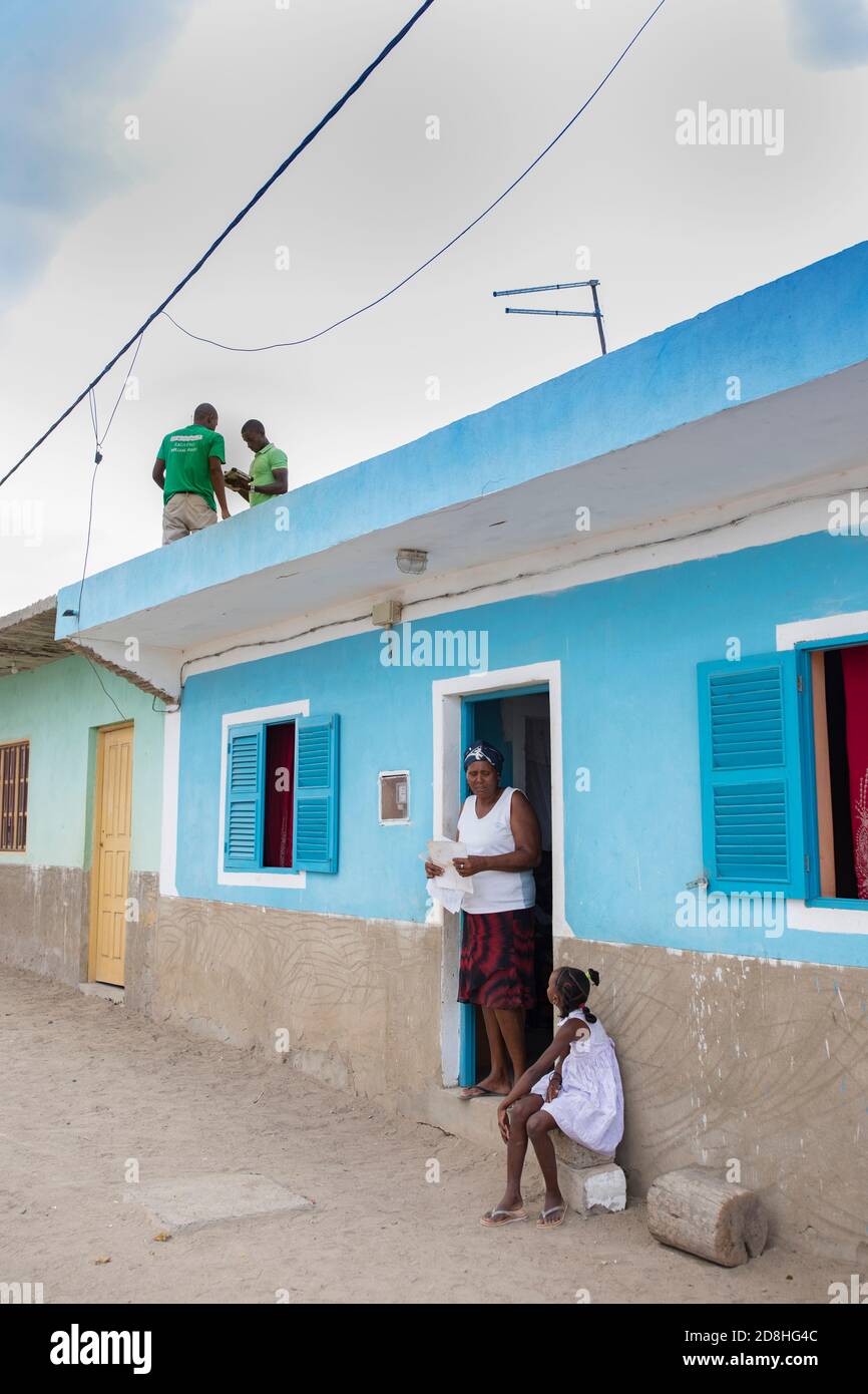 A group of cadastre technicians work to geomap a remote village on the island of Maio, Cape Verde, as part of a national land boundary survey. Stock Photo