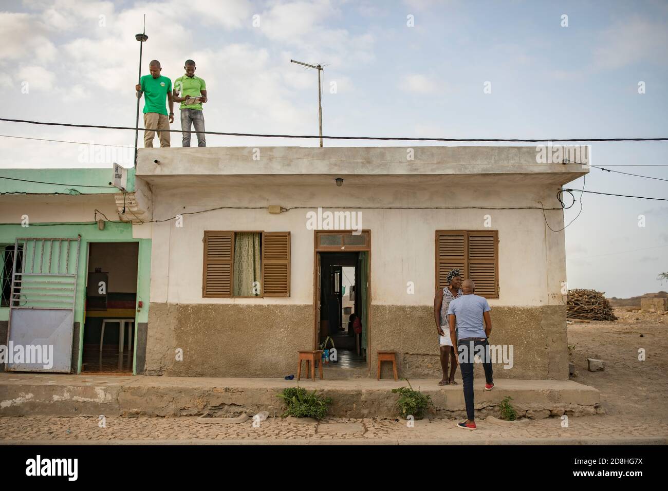 A group of cadastre technicians work to geomap a remote village on the island of Maio, Cape Verde, as part of a national land boundary survey. Stock Photo