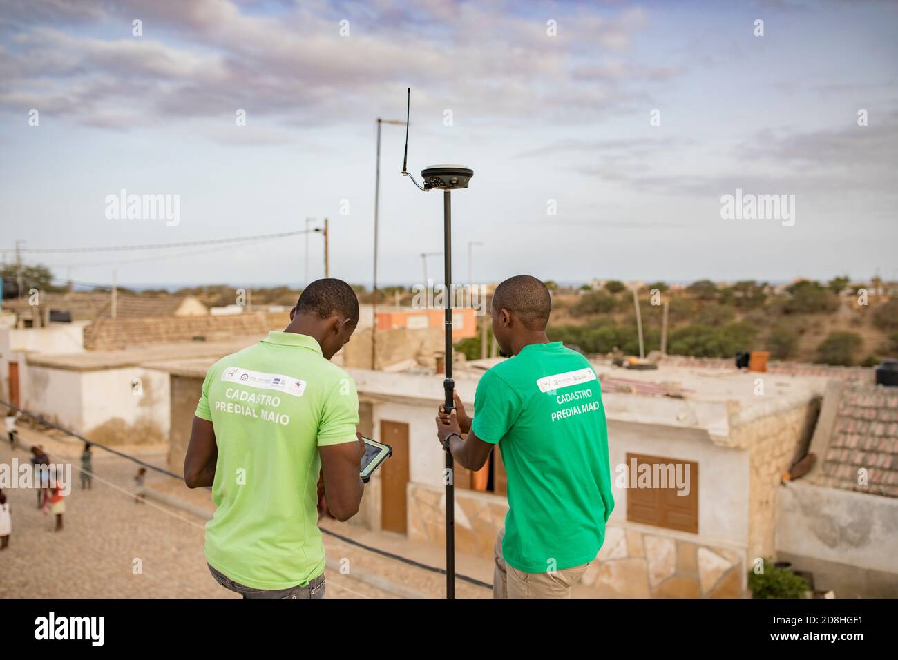 A group of cadastre technicians work to geomap a remote village on the island of Maio, Cape Verde, as part of a national land boundary survey. Stock Photo