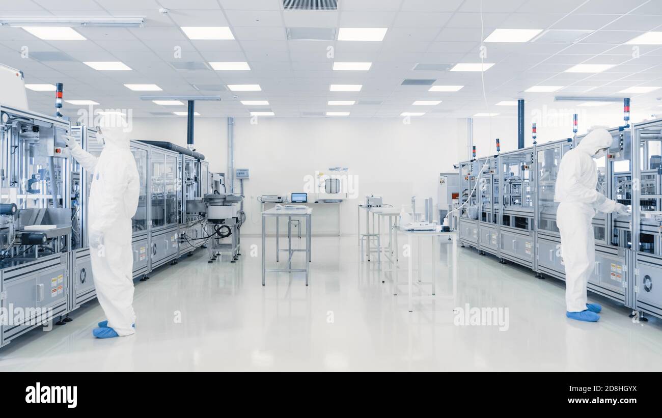 Scientists Working in Laboratory. Facility with Modern Industrial